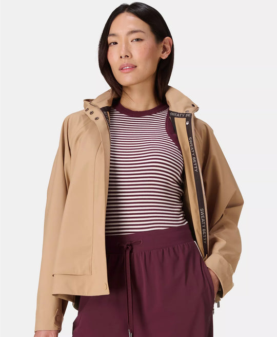 Women's Sweaty Betty Motion Waterproof Cropped Parka in Golden Beige