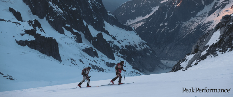 peak performance landing page two men skiing 