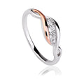Clogau Past Present Future ring showcasing a sterling silver band with rose gold accents and white topaz stones.