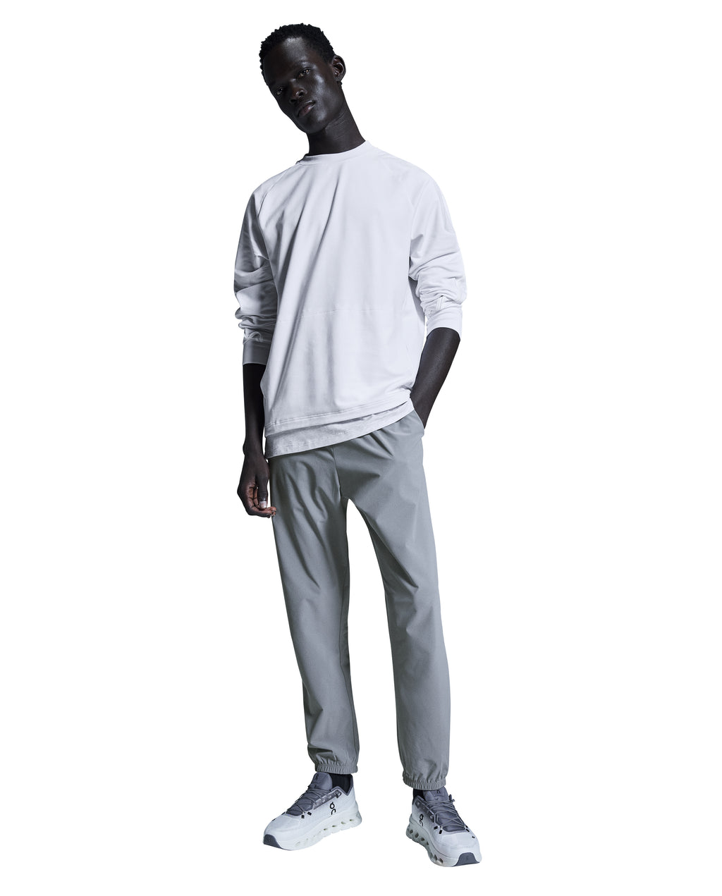 Men's On Running Rock Focus Pants with drawstring styled with on trainers