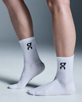 Unisex On Running White Logo High 3-Pack Socks WITH ON LOGO worn on model