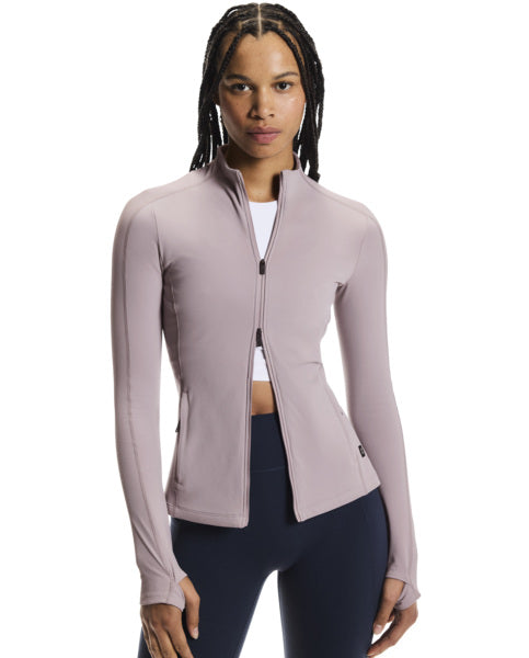 Woman wearing a light purple jacket on a white background
