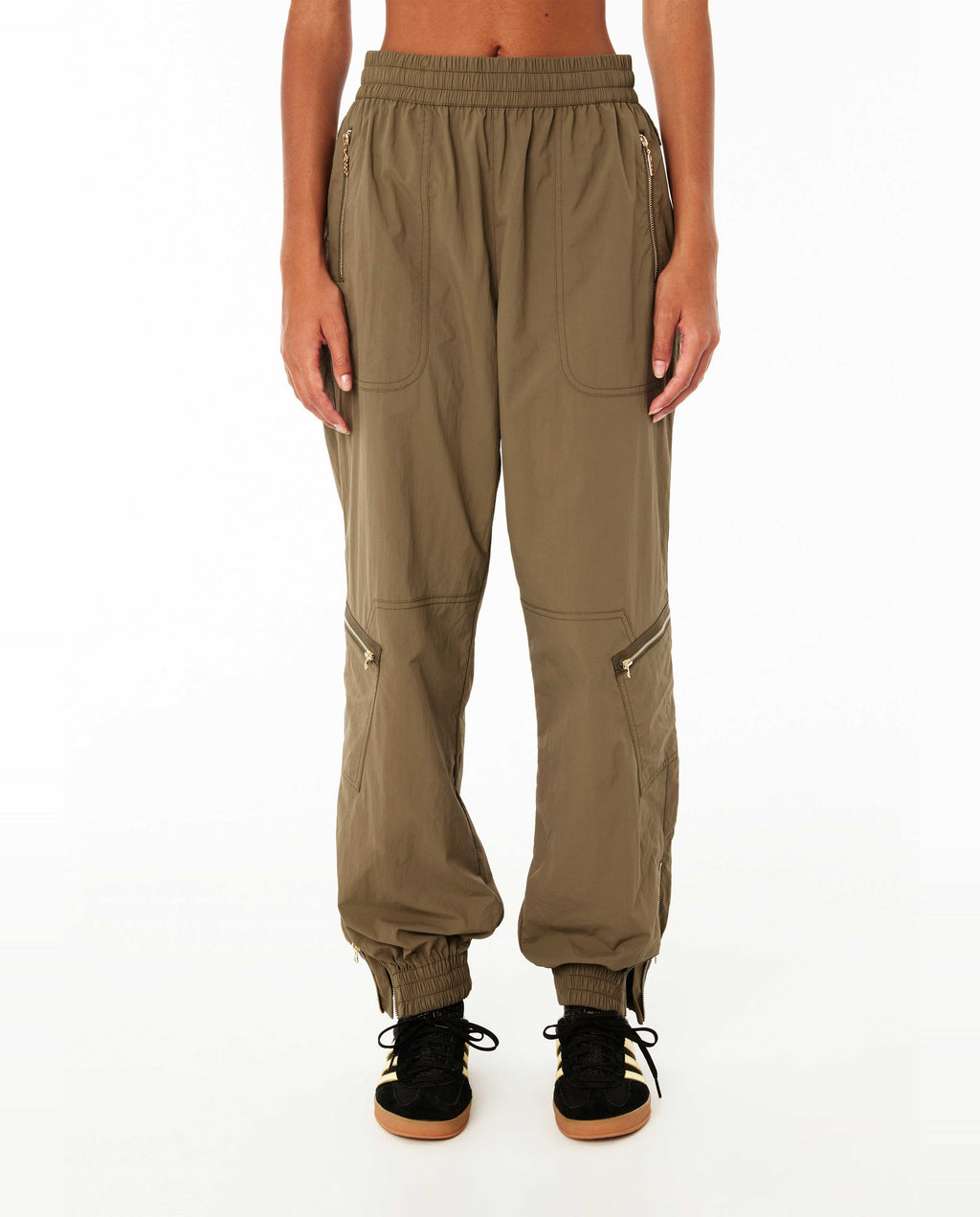 A pair of women's khaki cargo pants with multiple pockets and an elastic waistband, designed for a relaxed fit.
