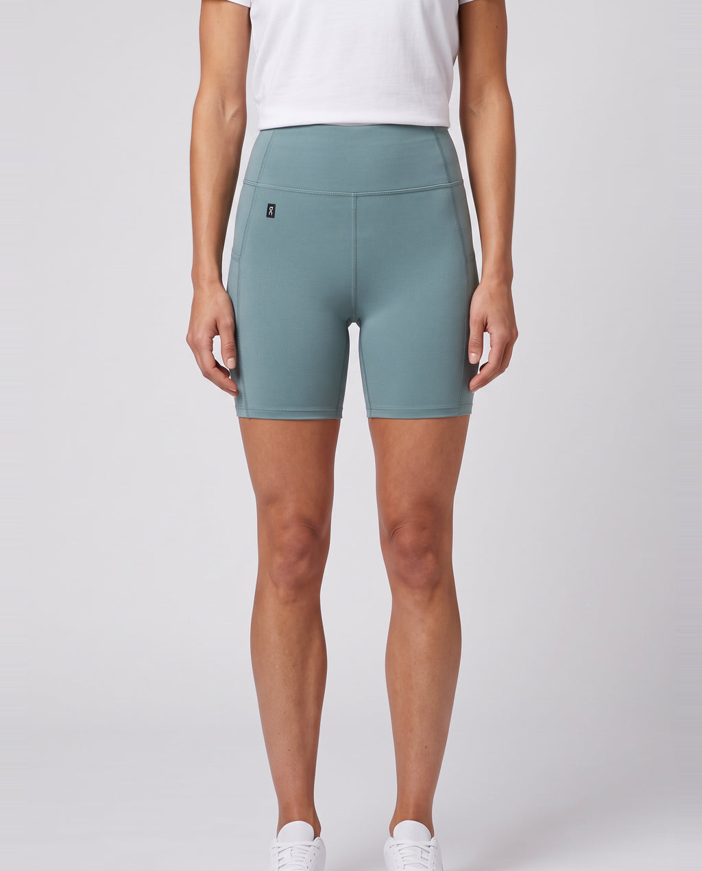 Women's On Running Studio Tights Short 6 inch Agave worn by model