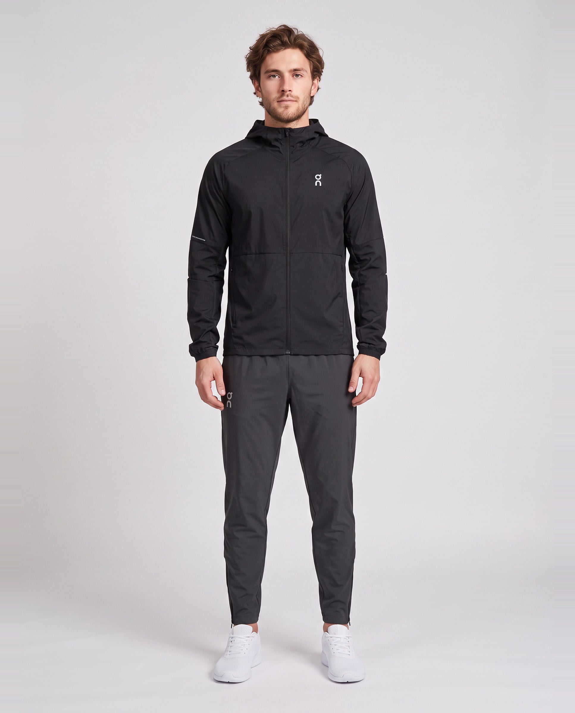 Men's On Running Core Jacket 1 Black | Eclipse & Core Pants Eclipse Tracksuit Set — on model