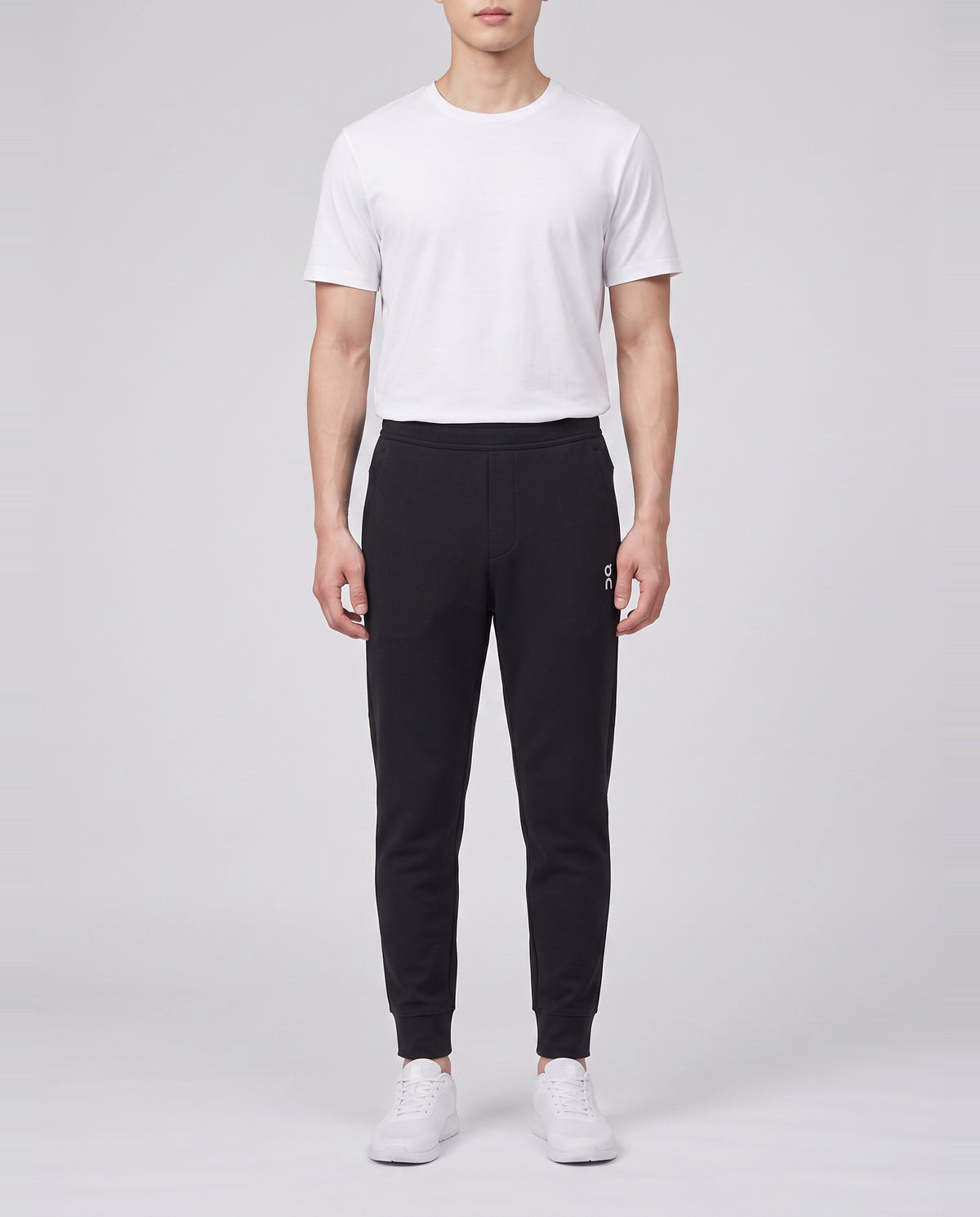 Men's On Running Black Focus Tech Sweatpants — on model