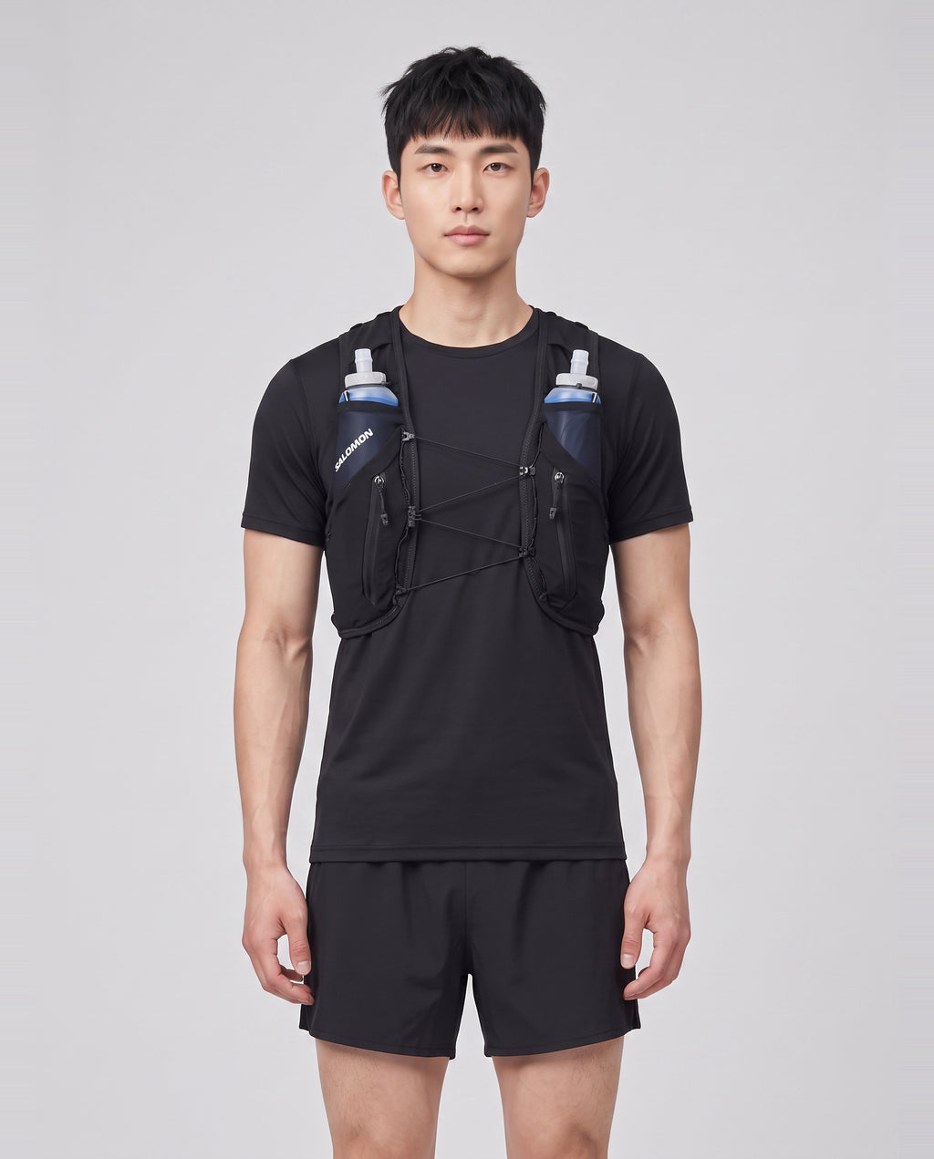 Salomon Unisex Adv Skin 12 Running Vest Pack — on model