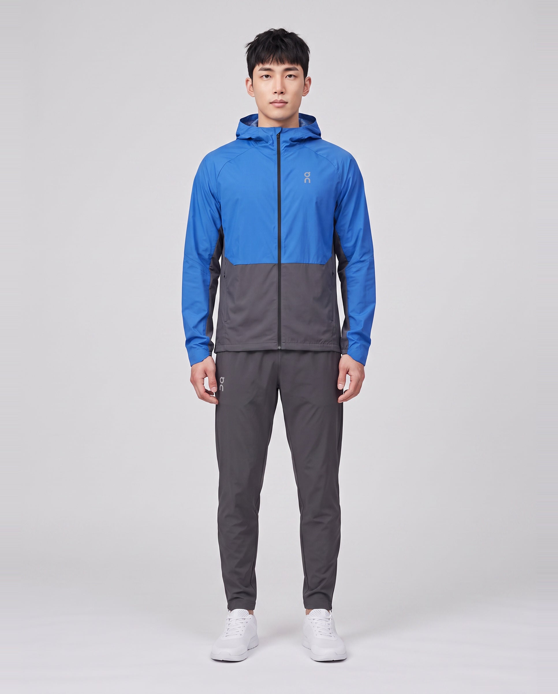Men's On Running Core Jacket 1 Jay | Eclipse & Core Pants Eclipse Tracksuit Set — on model