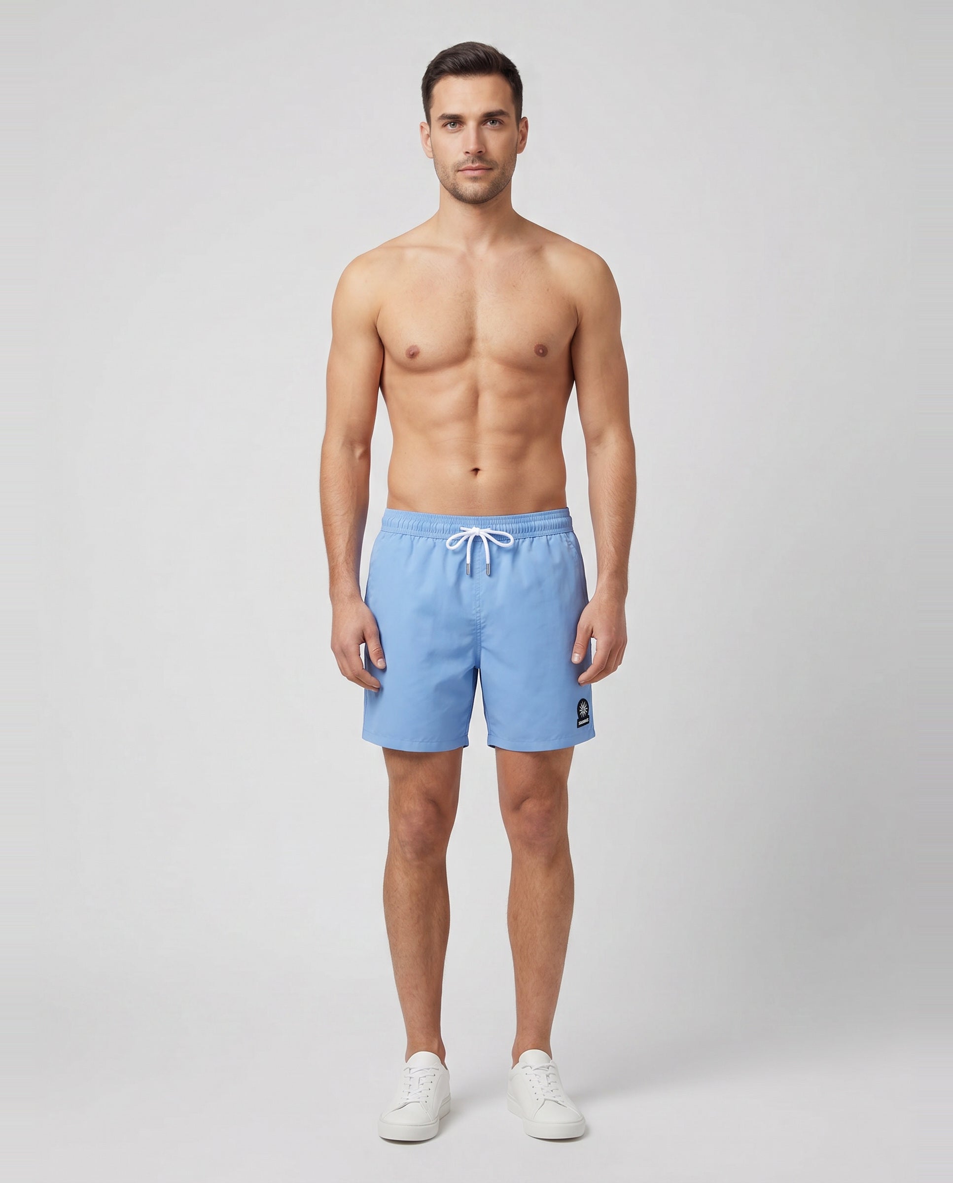 Men's Sandbanks Dusty Blue Badge Logo Recycled Swim Short — on model