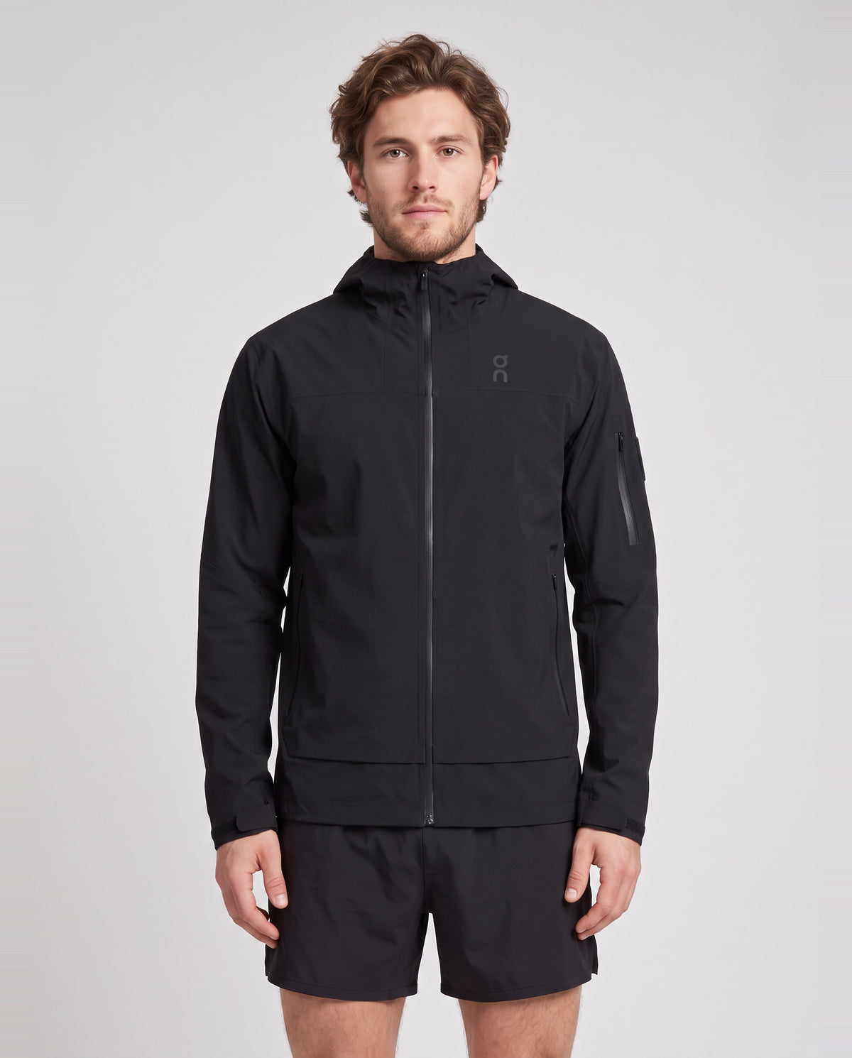 Men's On Running Black Trek Waterproof Jacket — on model