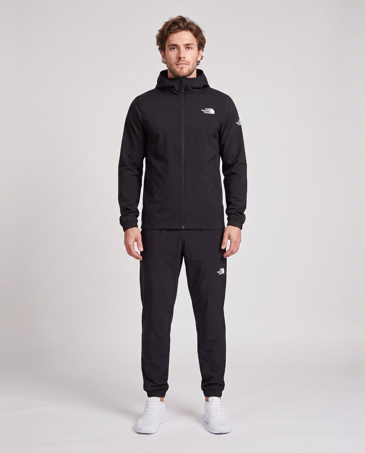 Men's The North Face Black Mountain Athletics Hooded Wind Jacket & Pant Tracksuit Set — on model