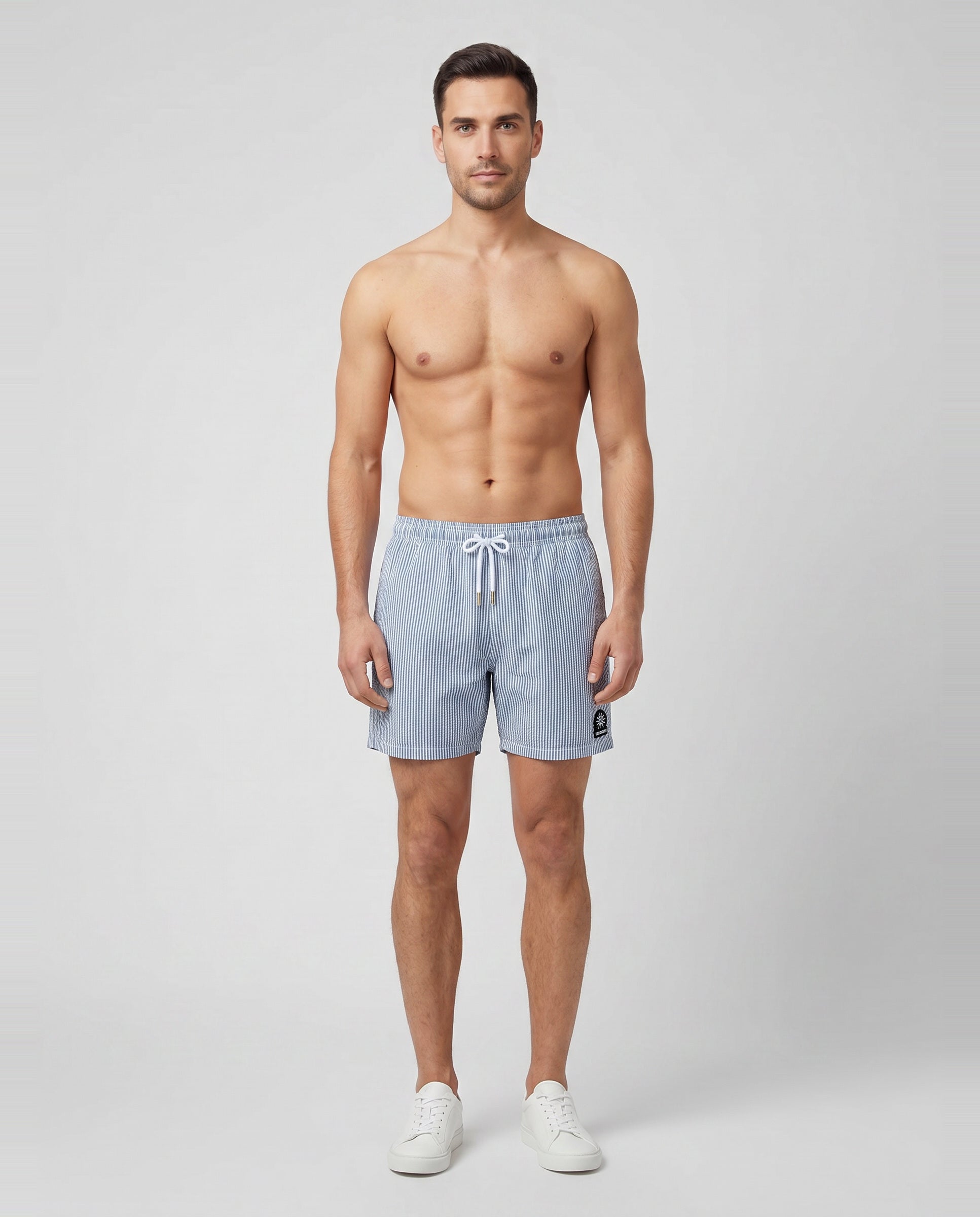 Men's Sandbanks Navy Seersucker Swim Short — on model