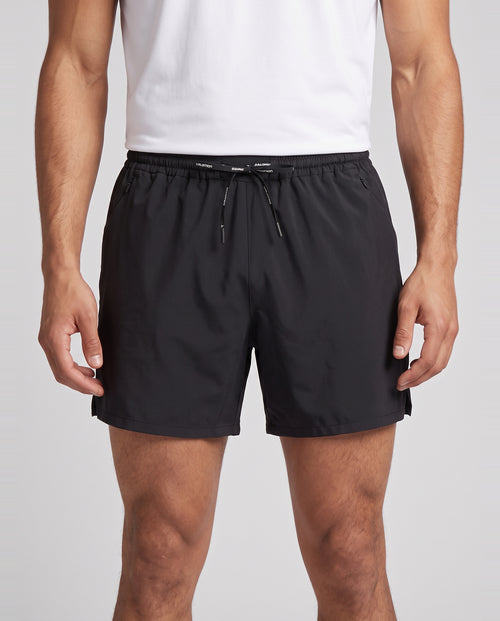 Men's Salomon Deep Black SHKout Core 7" Shorts — on model
