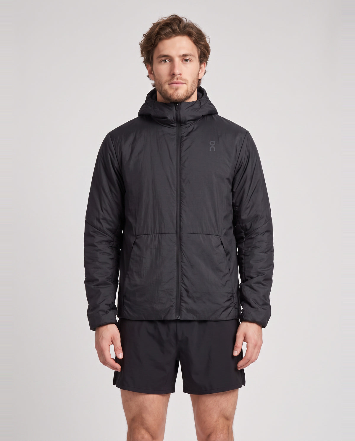 Men's On Running Black Trek Insulated Jacket — on model