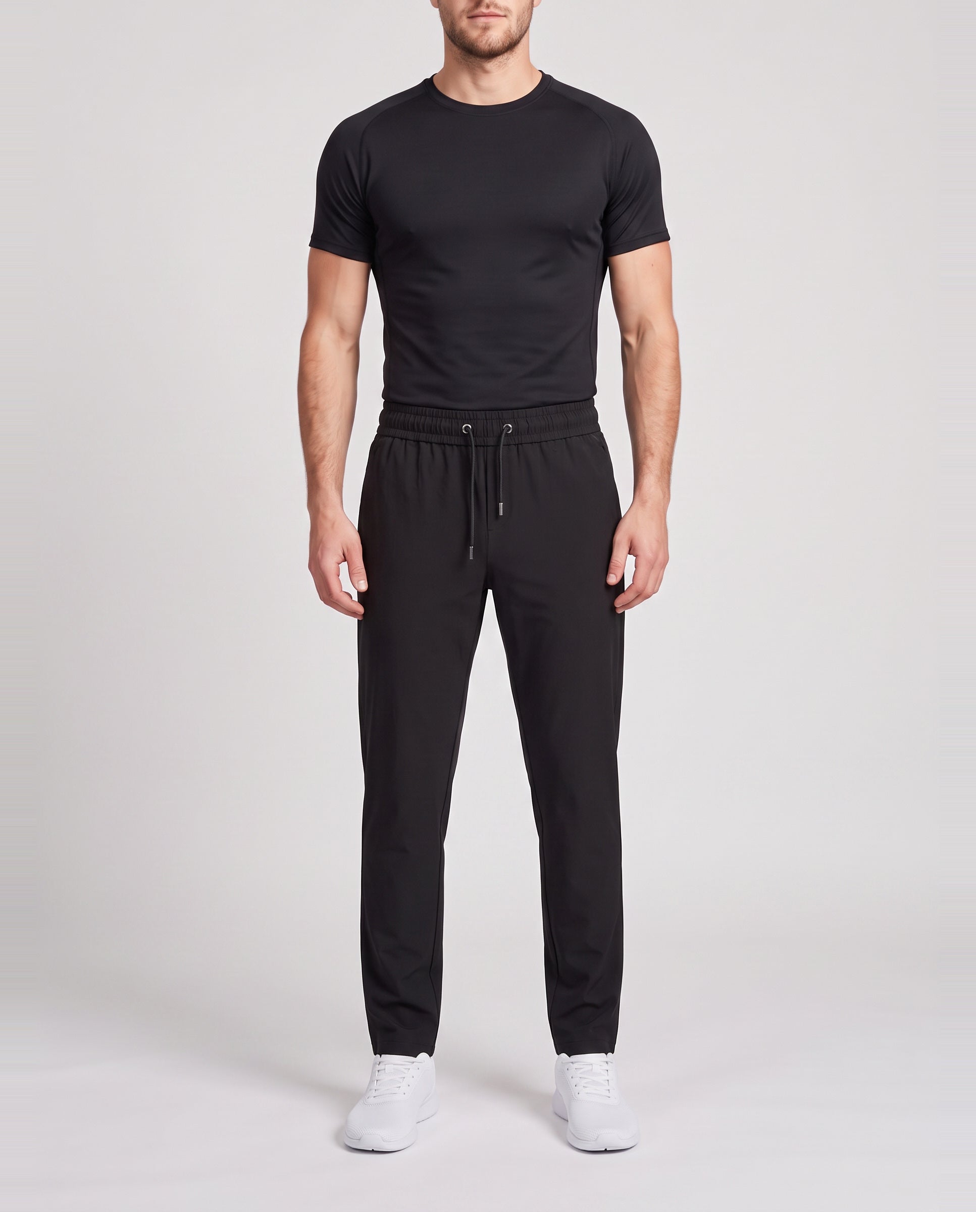 Men's Catini Intorno Tech Trousers in Black — on model