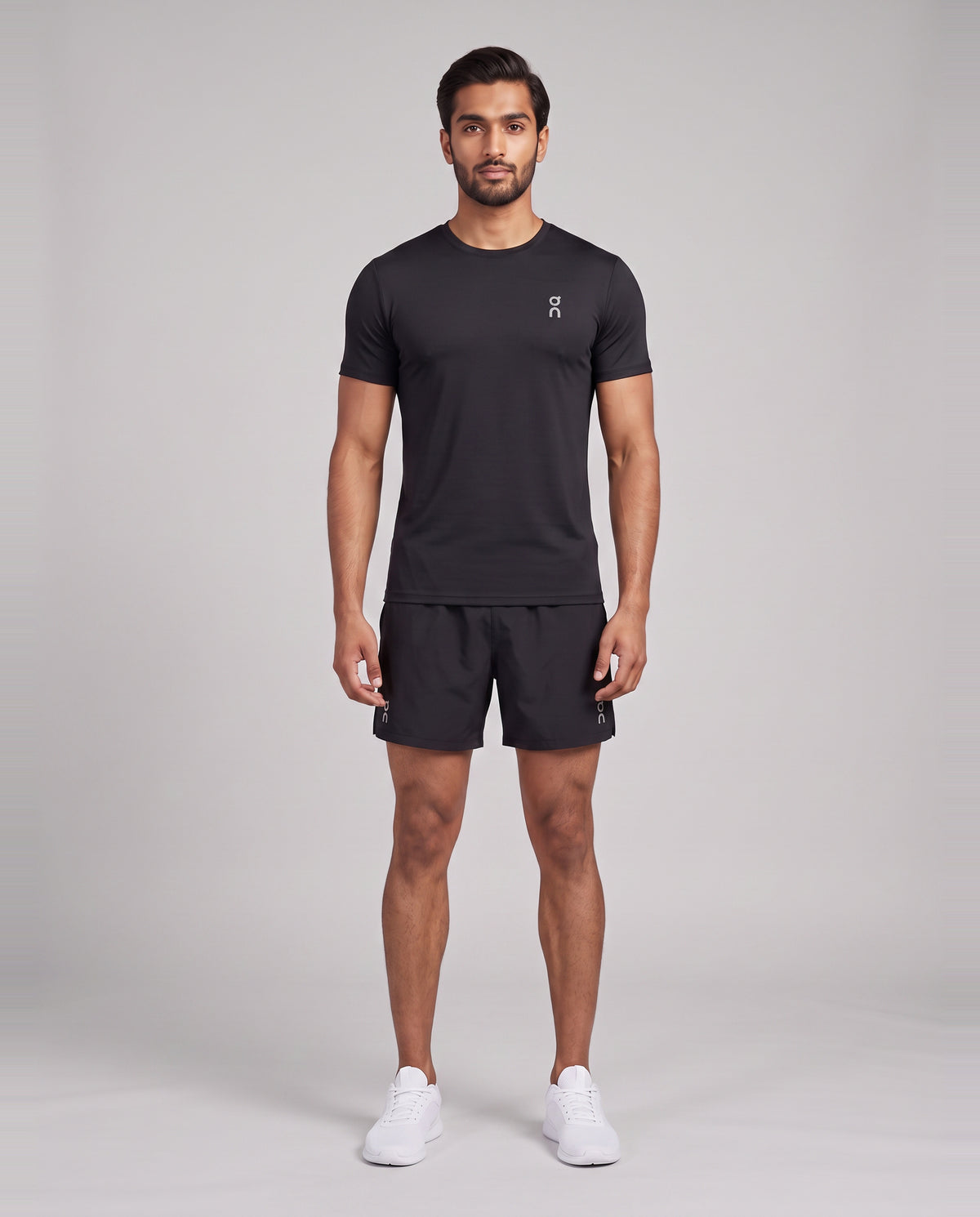 Men's On Running Black Core T Shirt & Black 7" Core Shorts Set — on model