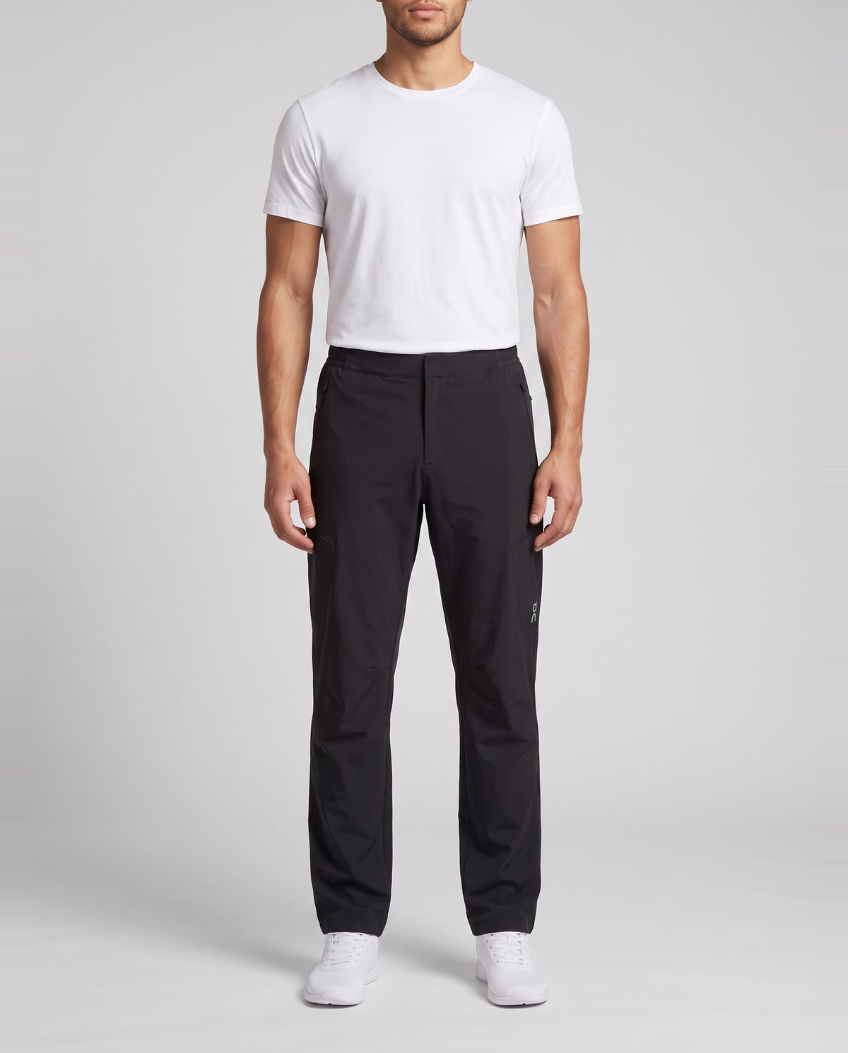 Men's On Running Black Water Resistant Trek Pants — on model