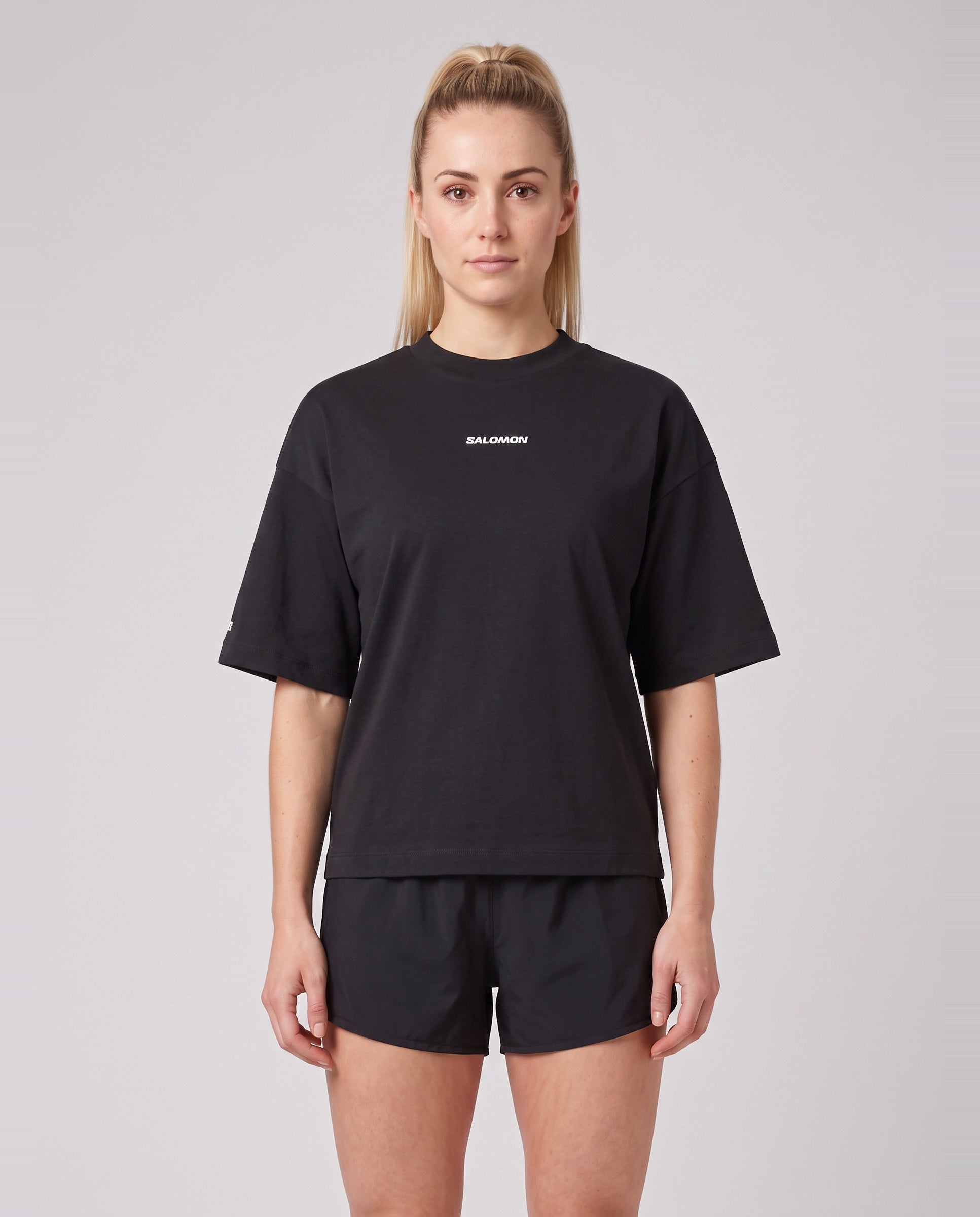 Womens Salomon LOGO SS TEE Deep Black T Shirts — on model