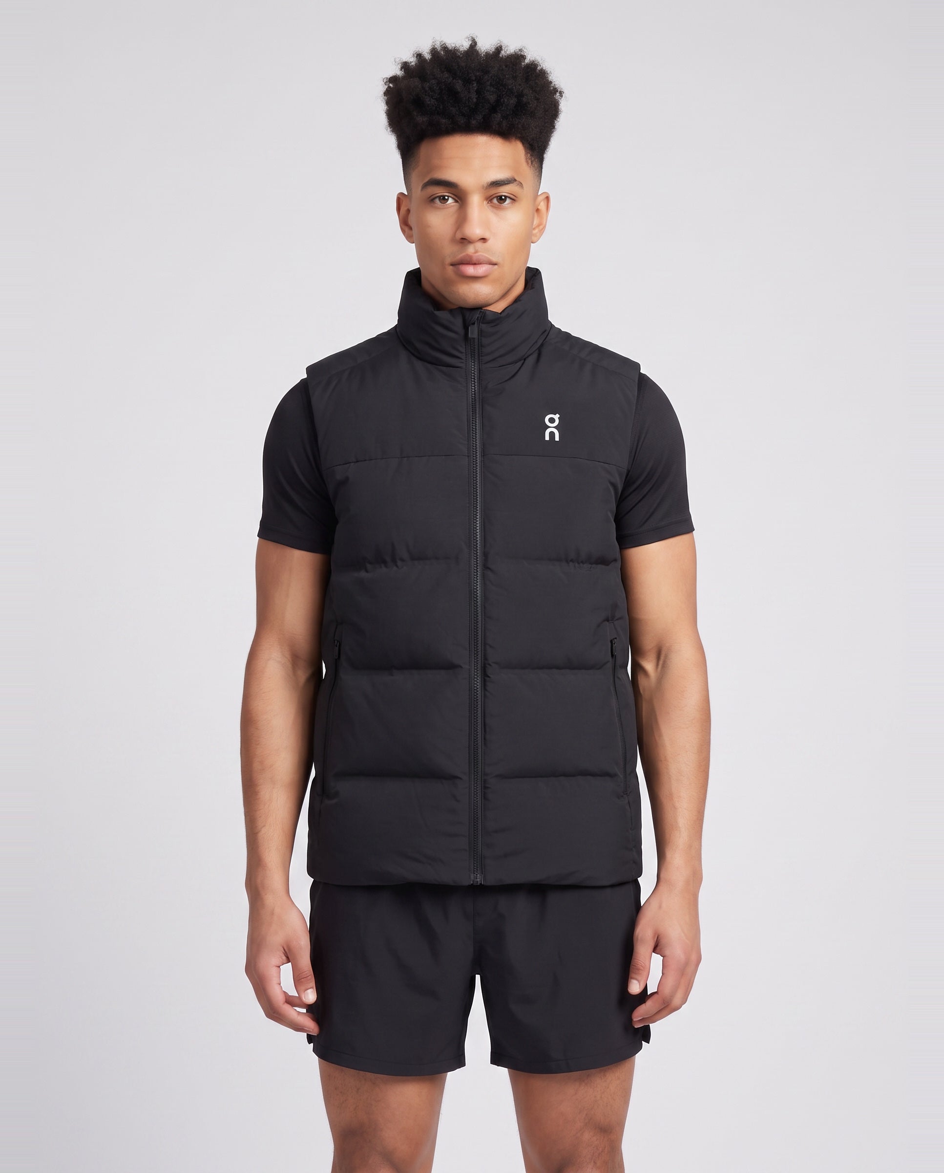 Men's On Running Black All Day Puffer Vest — on model