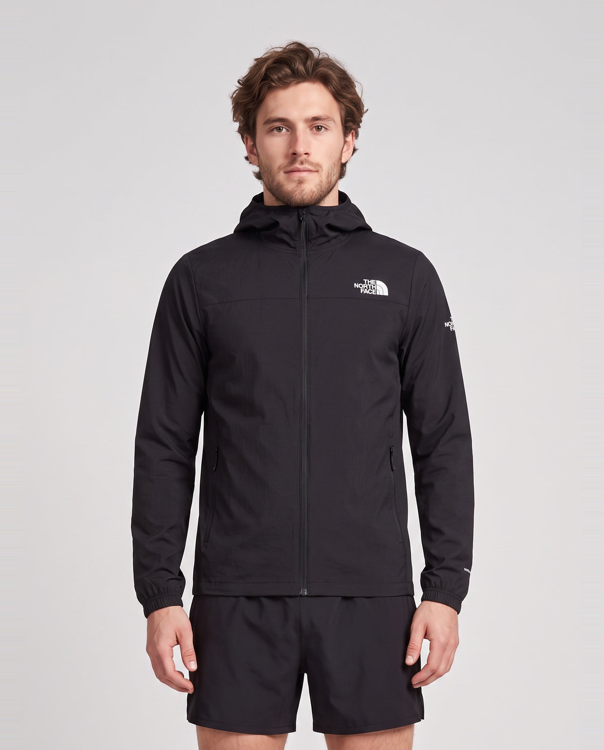 Men's The North Face Black Mountain Athletics Hooded Wind Jacket — on model
