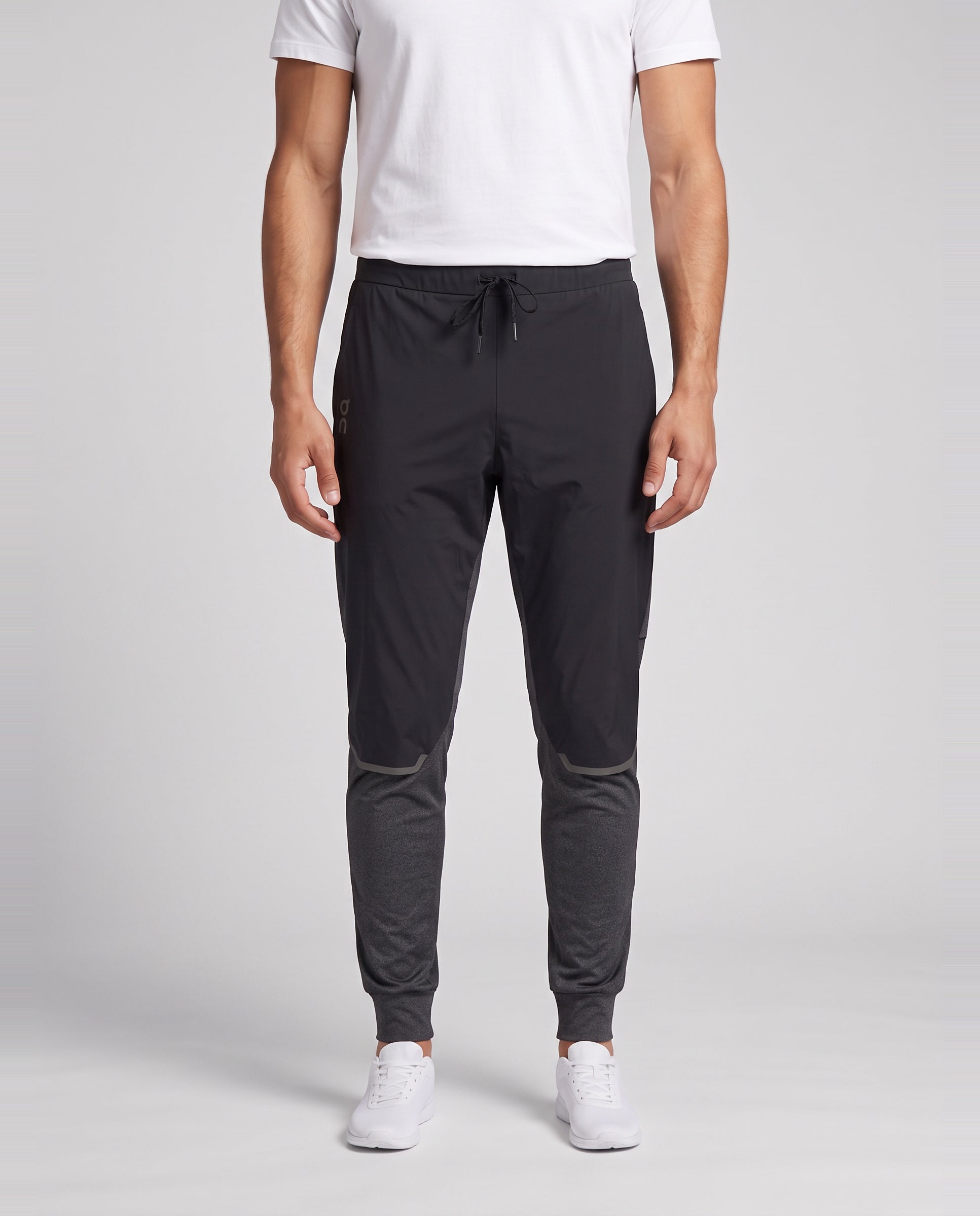 Men's On Running Black Weather Pants — on model