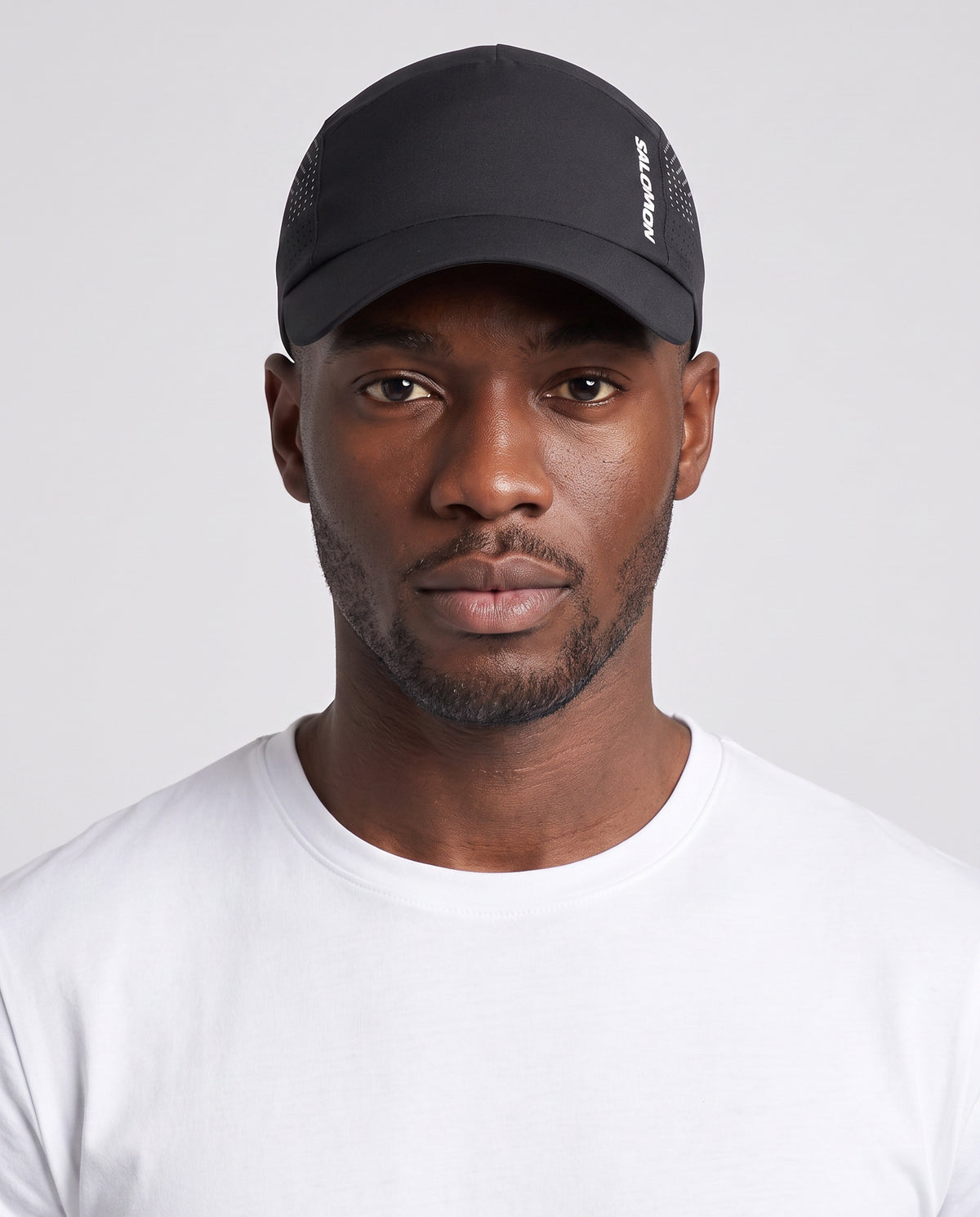 Unisex Salomon Black Shkout Cap — on model