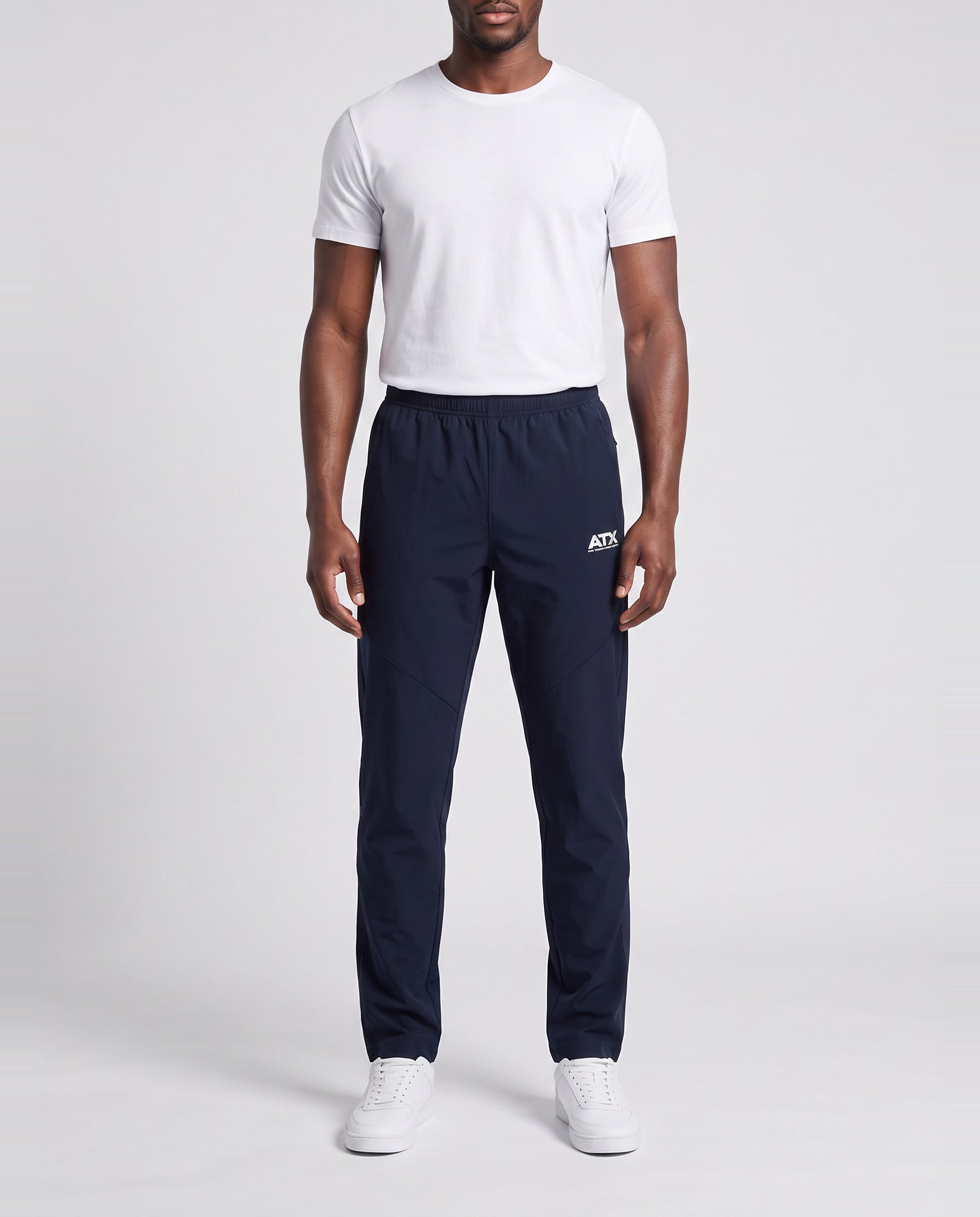 Men's ATX Traverse Track Pant in Black — on model