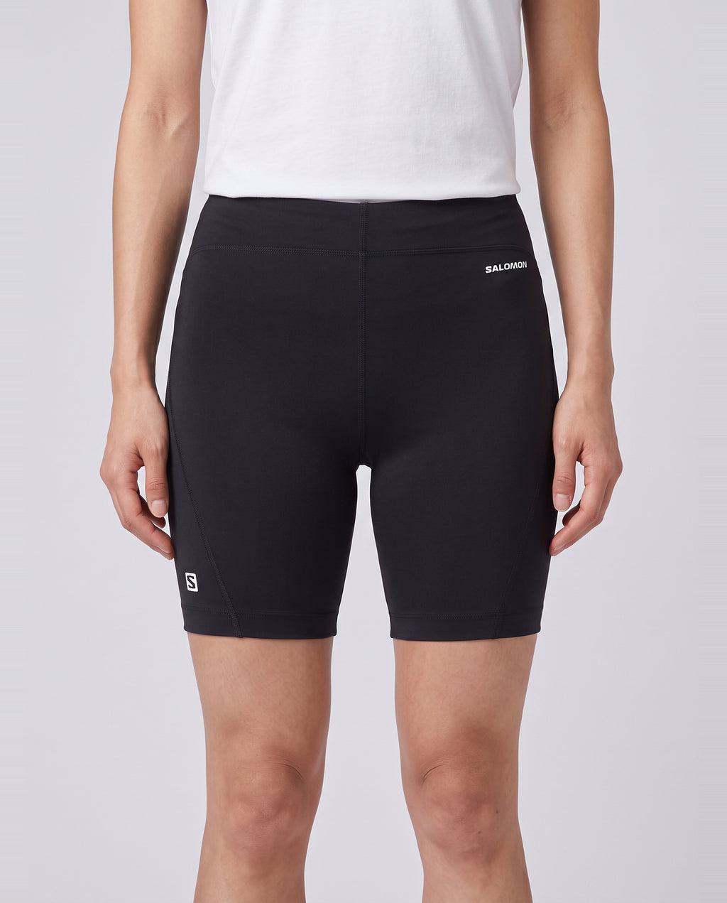 Womens Salomon Shakeout Core Shorts 6" in Black — on model