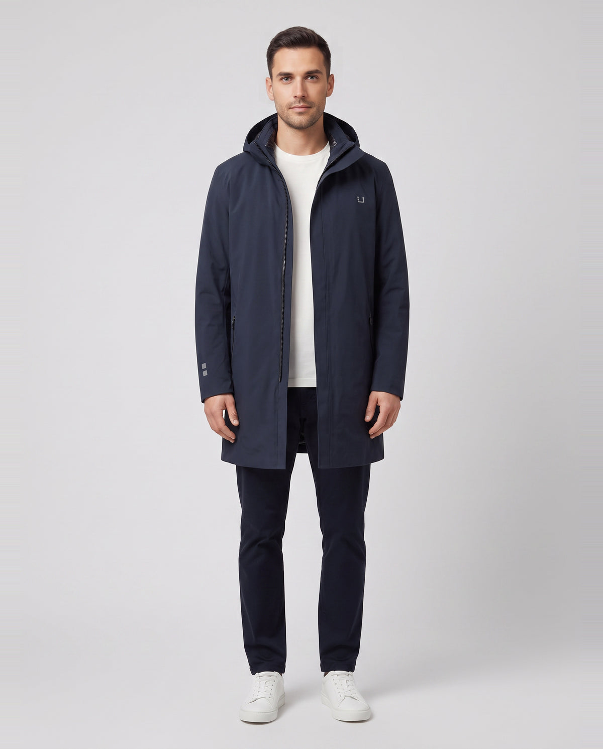 Men's UBR Black Storm Coat in Navy — on model