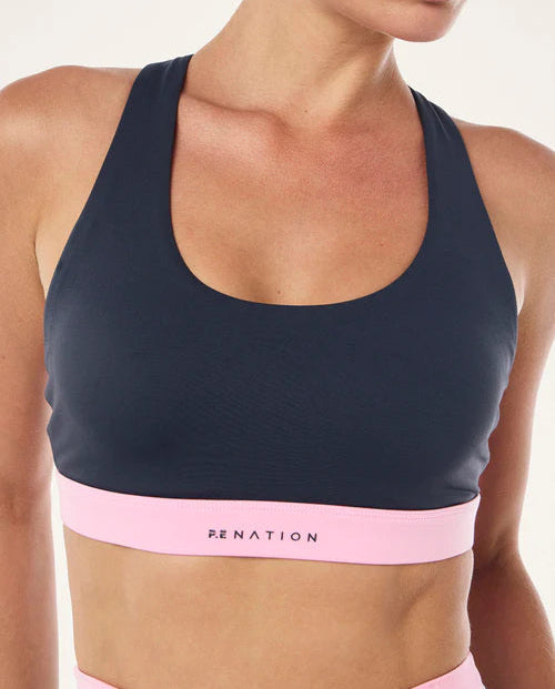 Women's P.E Nation Lumify Sports Bra in Marine Blue and pink