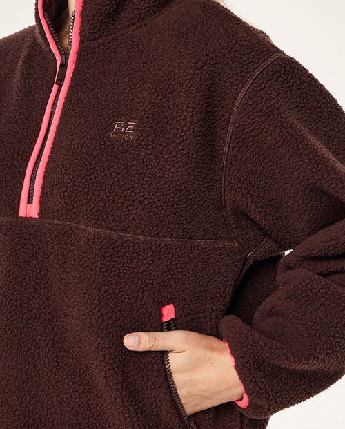 Brown fleece pullover with pink accents on a white background