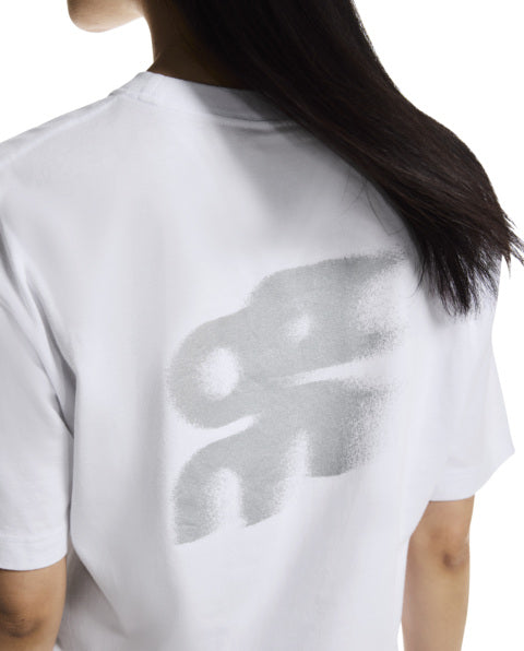 White t-shirt with a logo on the back worn by a person