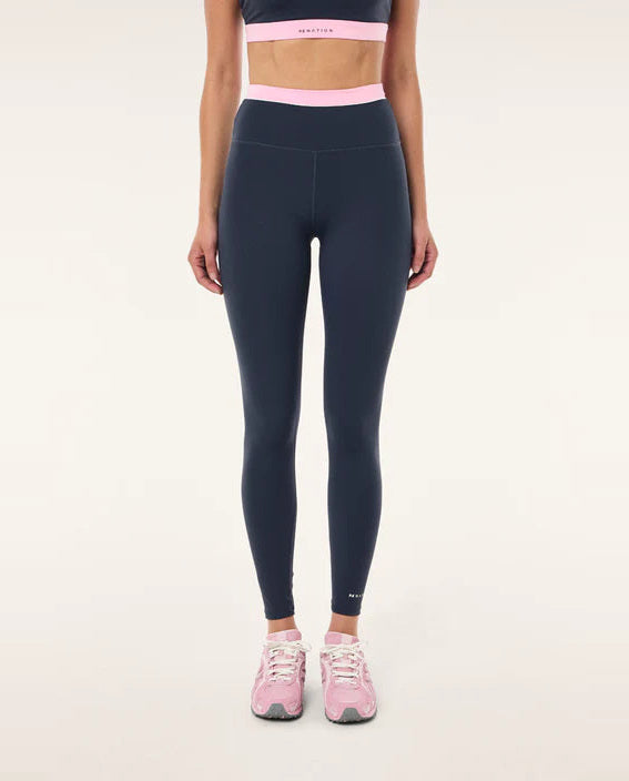 navy blue sports leggings with a pale pink waistband detail