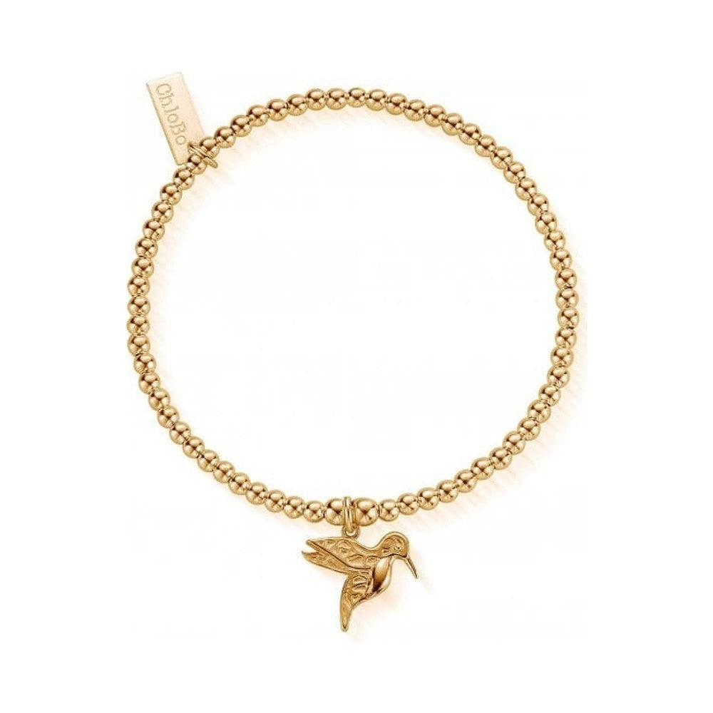 ChloBo charm bracelet, gold-plated with delicate hummingbird pendant, showcasing detailed craftsmanship and design.