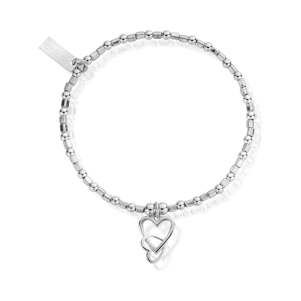The ChloBo Interlocking Love Heart Bracelet, a silver metal bracelet from ChloBo, available at OD’s Jewellers in St Helens.