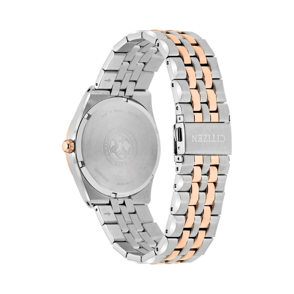 Back view of a Citizen Eco Drive watch showing stainless steel and rose gold band with the "CITIZEN" logo on clasp.
