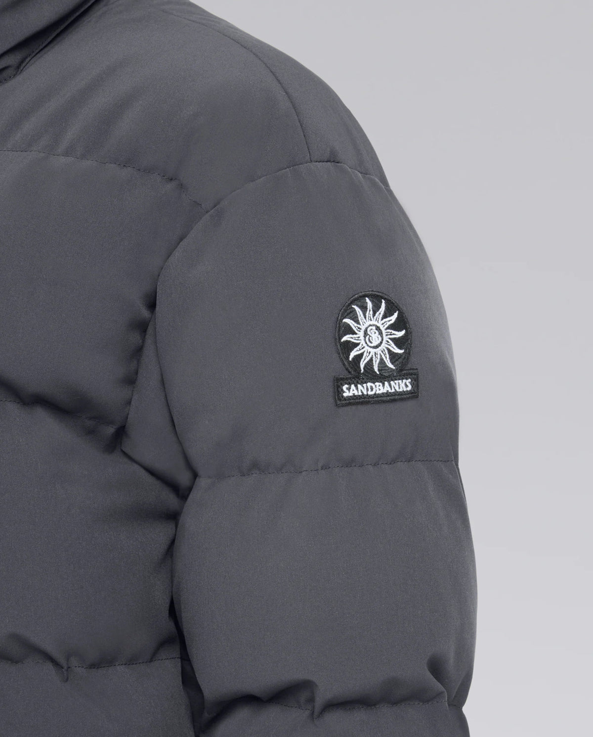 close up of Sandbanks logo on grey Haven jacket