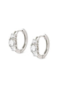 Silver hoop earrings with three cubic zirconia stones, showcasing Nomination's Wave design details. Elegant jewelry.