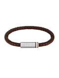 Close-up of the BOSS Ares braided leather bracelet in brown with a stainless steel clasp displaying the brand name.