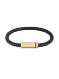 Mens BOSS Ares black braided leather bracelet with gold-plated BOSS logo detail, stylish wrist accessory.