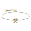 A two-tone silver and gold chain bracelet with a loop and knot center.