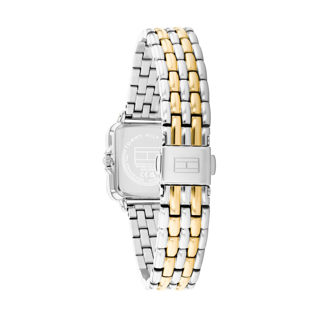 Back of a Tommy Hilfiger watch with silver and gold metal band.
