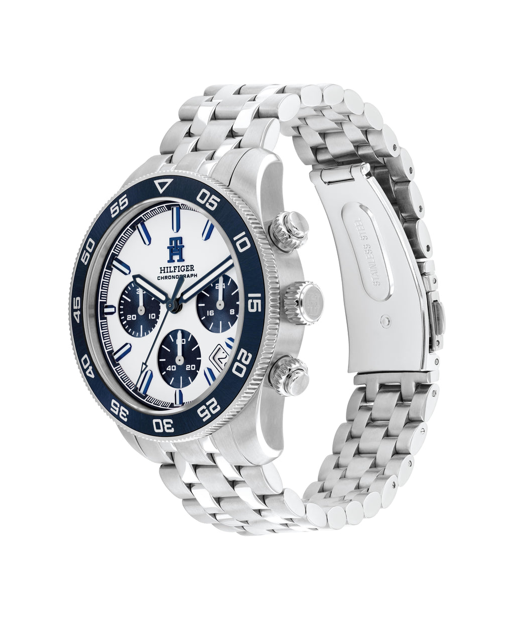 Close-up showcasing the Tommy Hilfiger TH85 chronograph watch with a white dial, blue bezel, and stainless steel band.