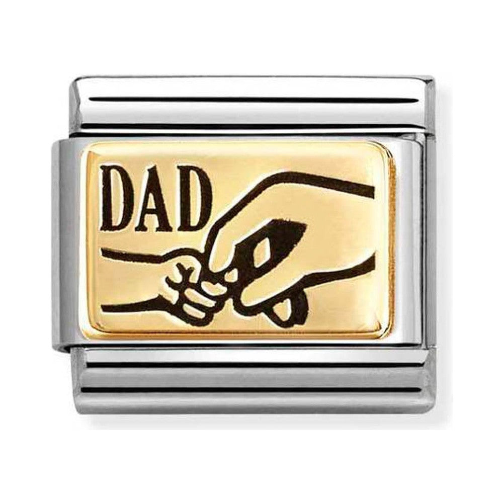 Silver and gold charm reading "Dad" with a graphic of a large hand holding a small hand.