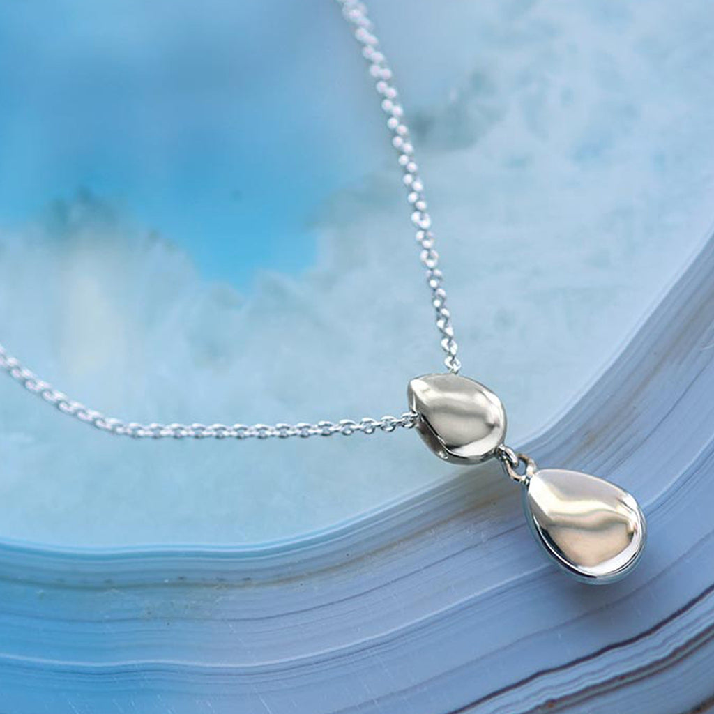 The Kit Heath Coast Pebble Double Droplet Necklace, a silver necklace from Kit Heath, at OD’s Jewellers in St Helens.
