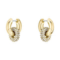 Two gold earrings with sparkling crystal-covered hoops.
