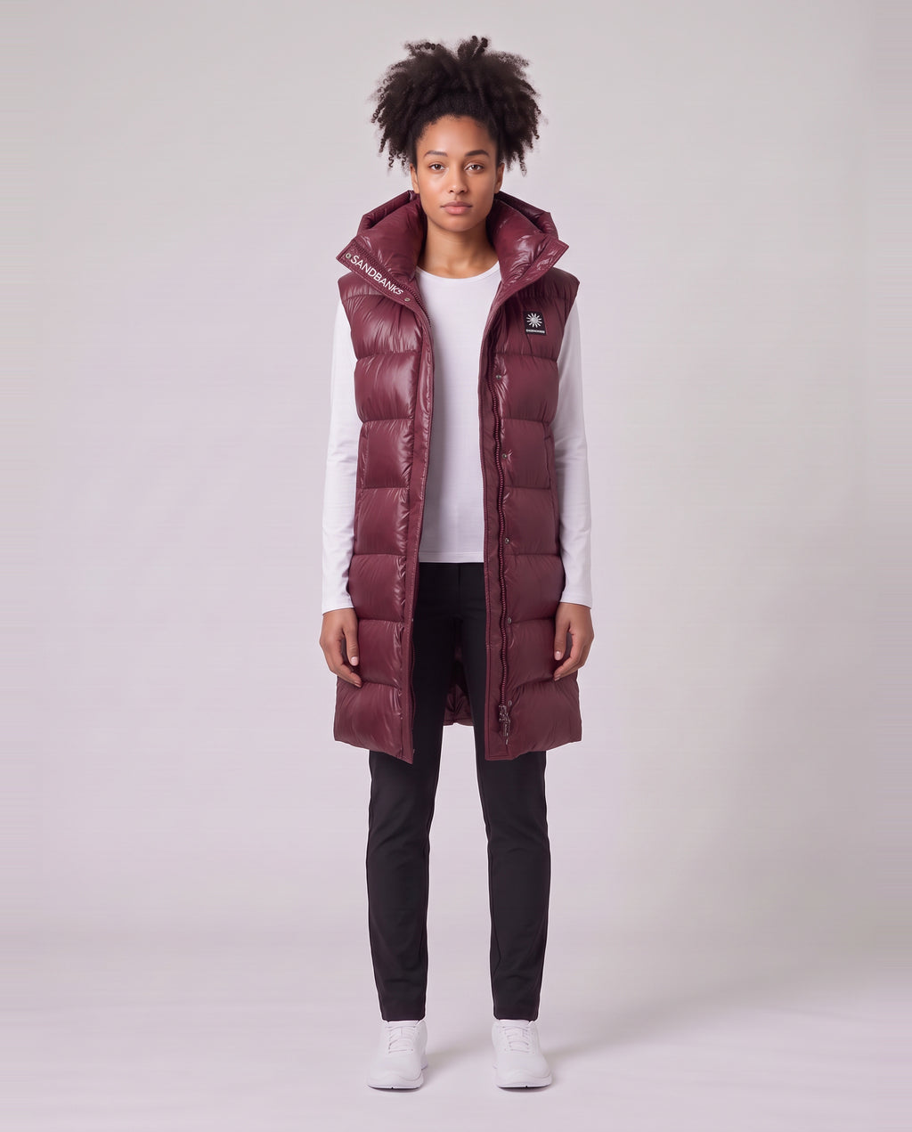 Women's Sandbanks Shell Bay Hooded Long Gilet in Port — on model