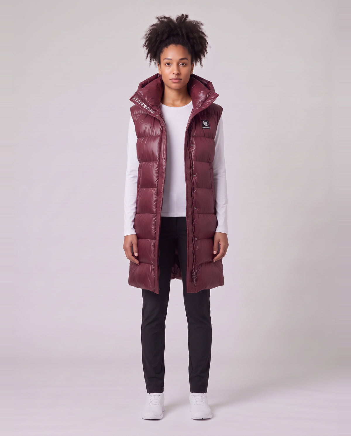 Women's Sandbanks Shell Bay Hooded Long Gilet in Port — on model