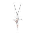 Clogau Vine Cross Pendant with Tree of Life design, featuring white topaz gems. Elegant jewelry.