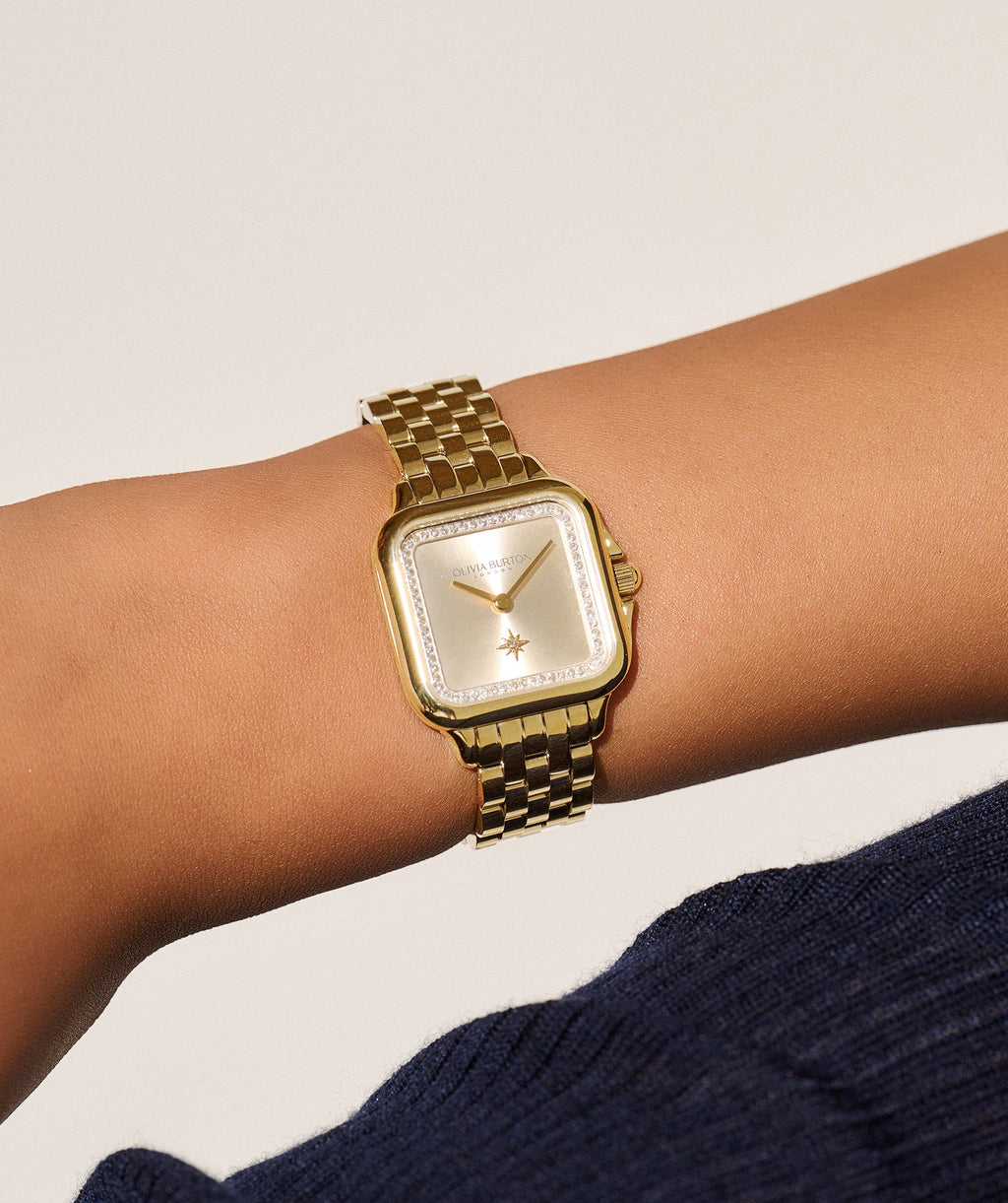 The Olivia Burton Grosvenor Square gold crystal dial bracelet watch gold plated, a gold plated bracelet watch from Olivia Burton, available at OD’s Jewellers in St Helens
